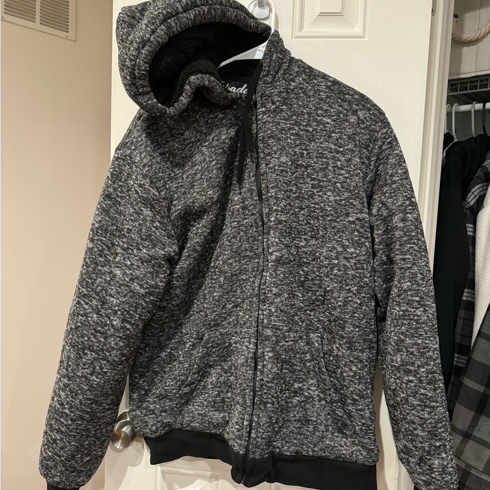 Never worn men’s zip up hooded sweatshirt.